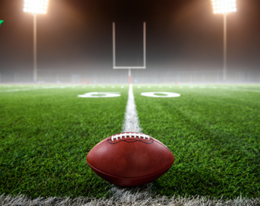 Football Sitting on a Football Field