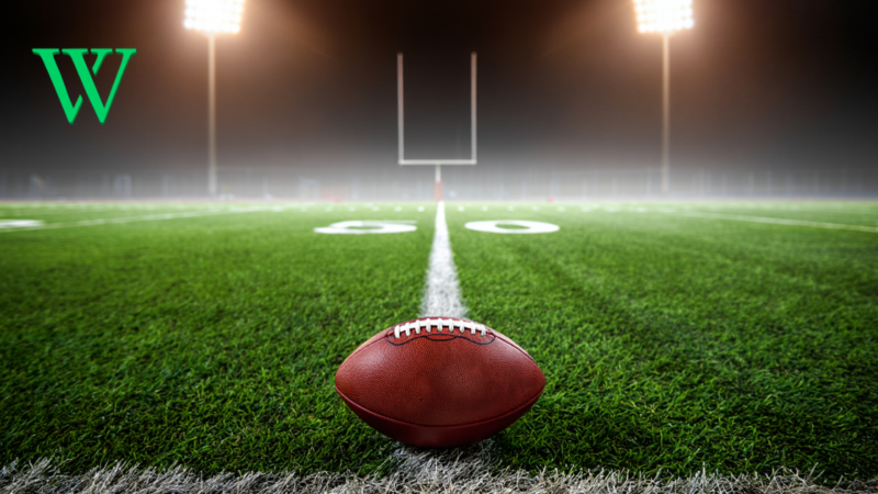 Football Sitting on a Football Field